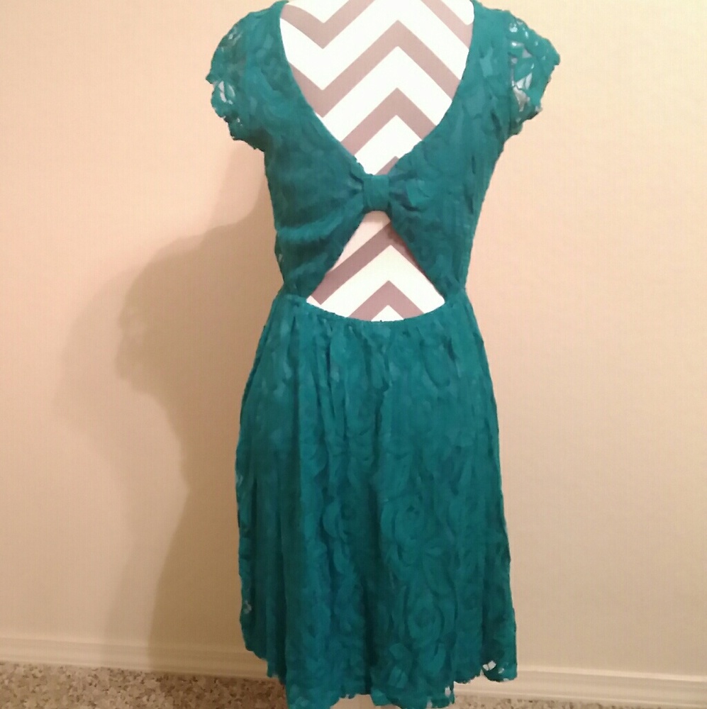 Floral Lace Dress with back cut out 
Size S 
teal